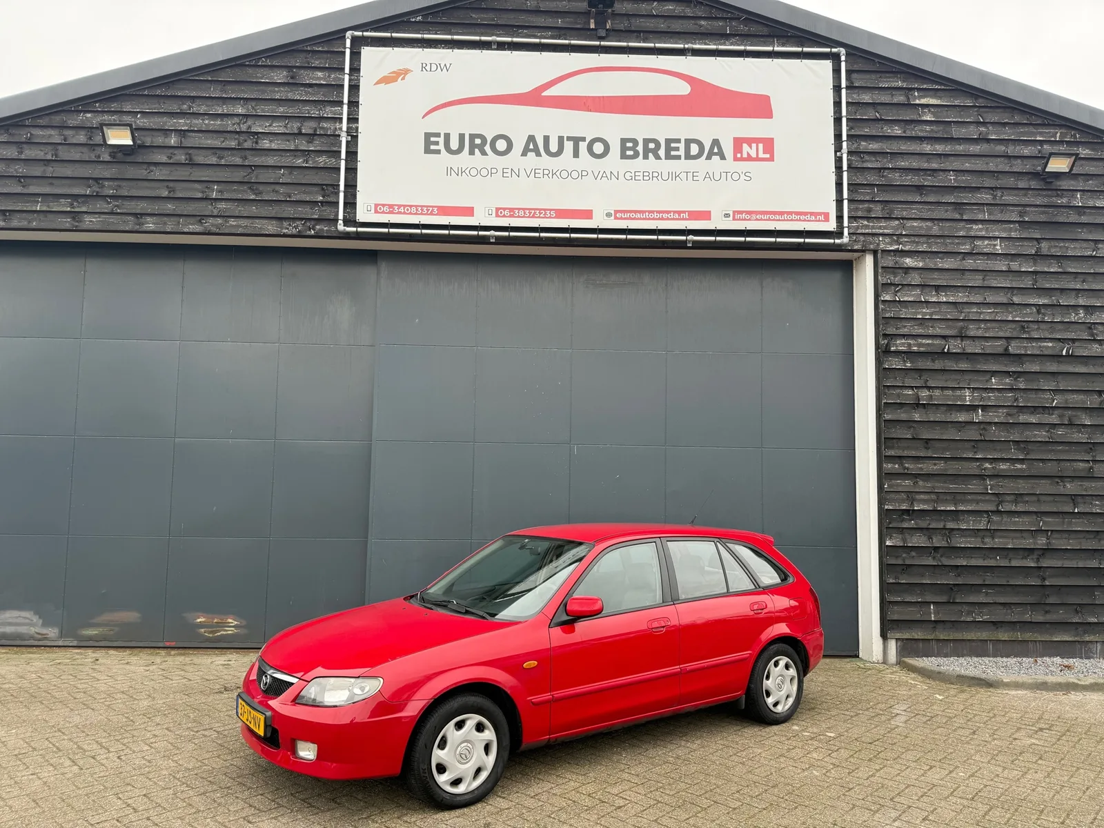 Mazda 323 Fastbreak (2002) — foto 1
