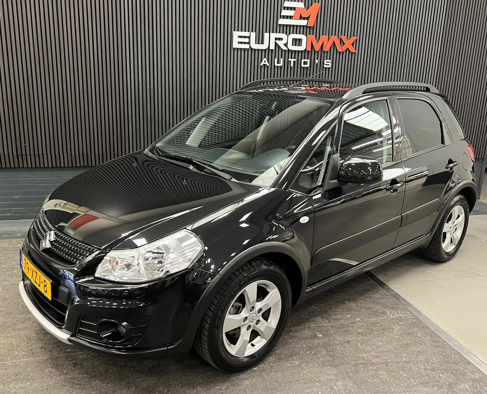 Suzuki SX4 (2012) — foto 1