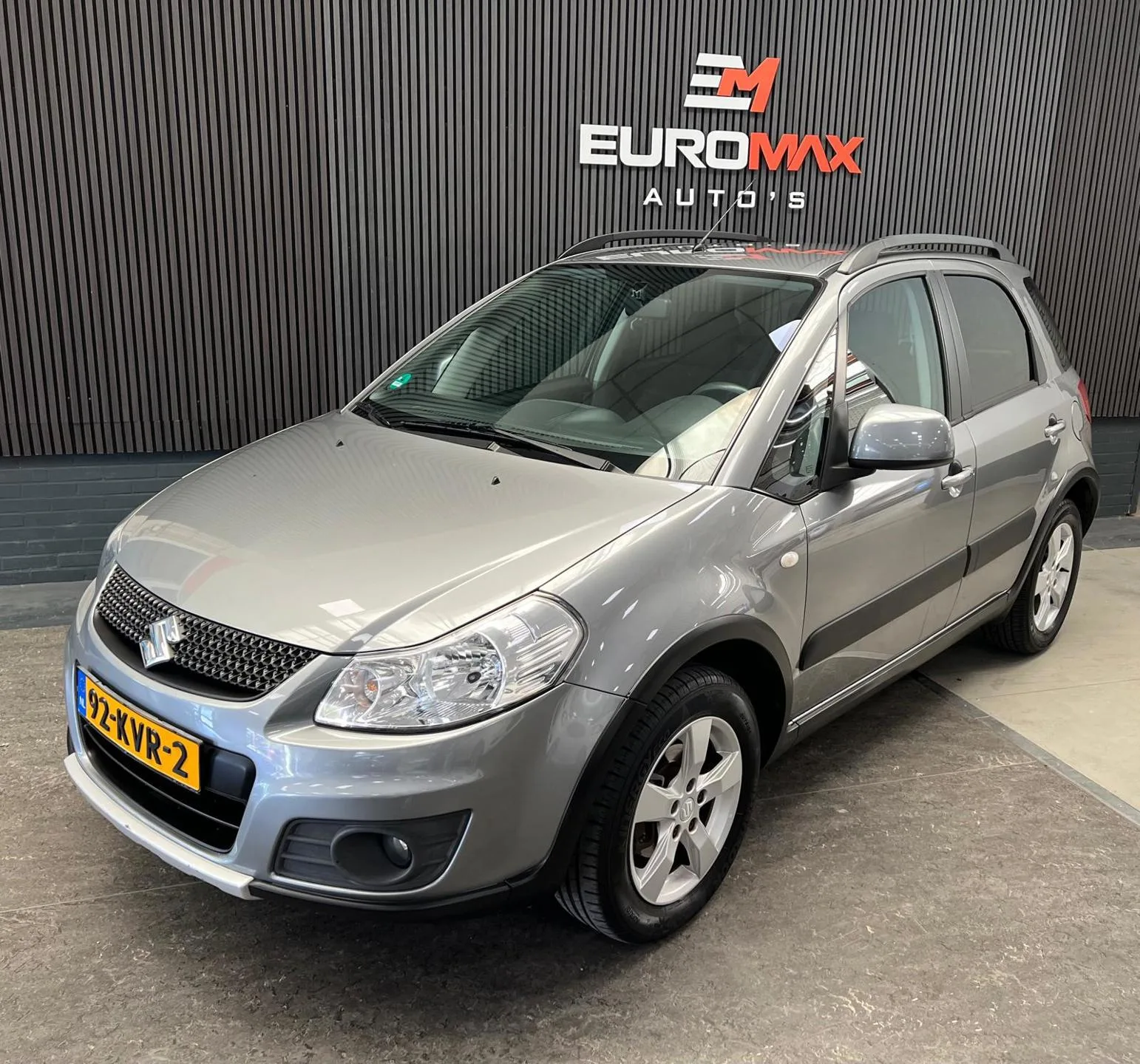 Suzuki SX4 (2010) — foto 1