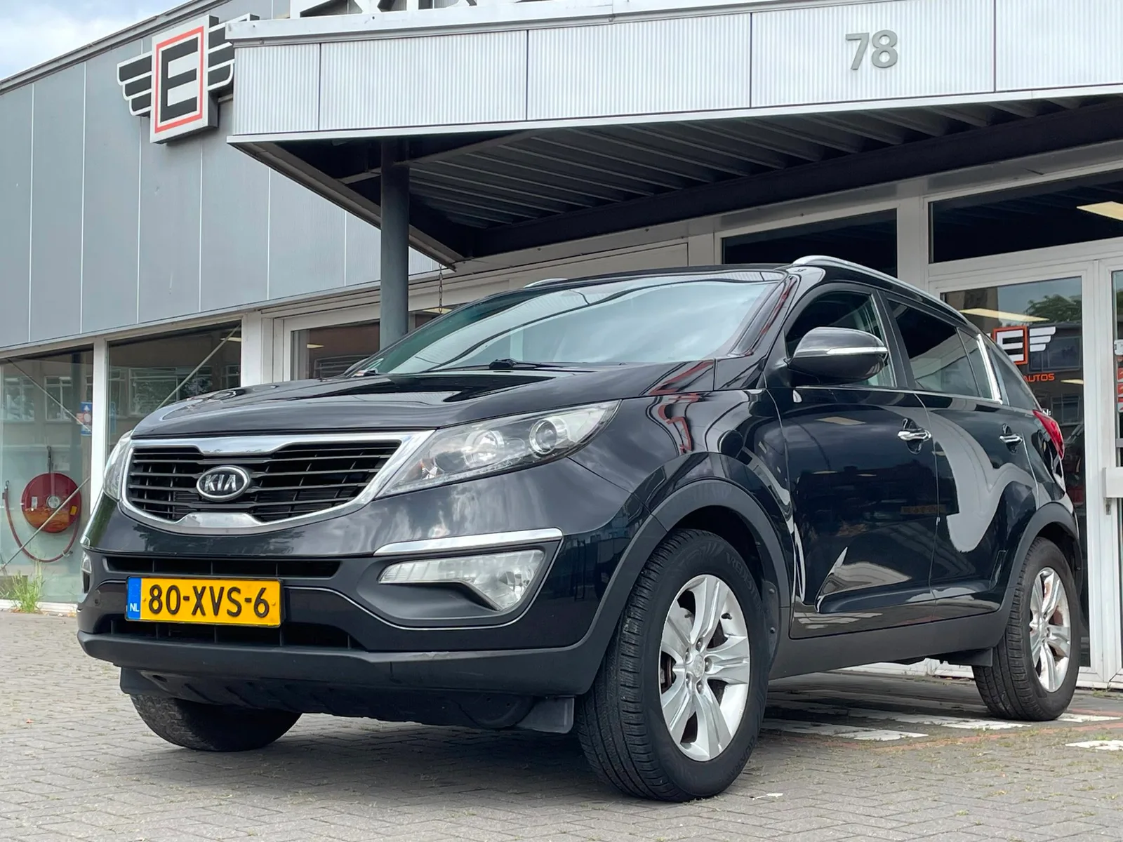 Kia Sportage (2012) — foto 1