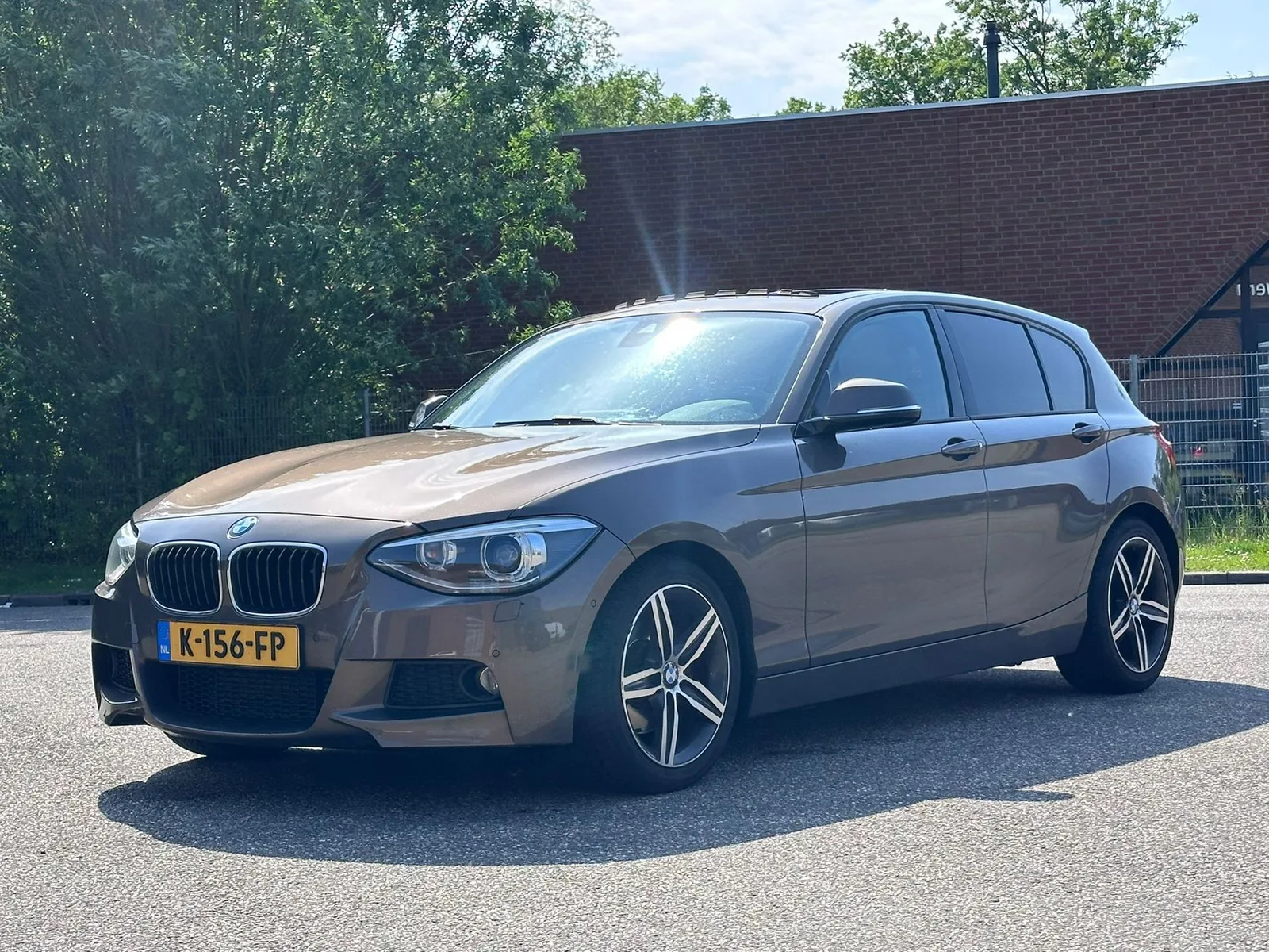 BMW 1-Serie (2012) — foto 1