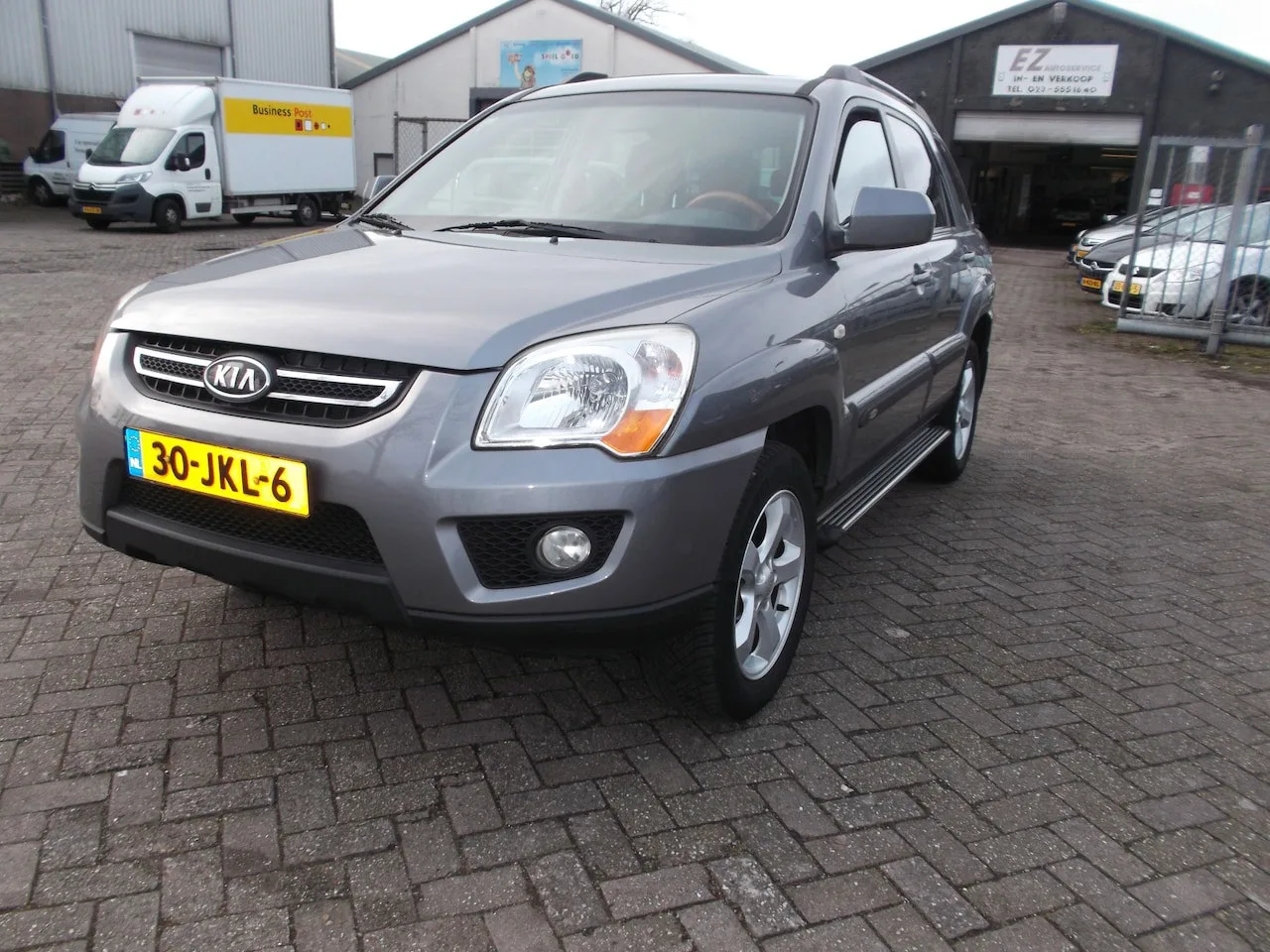 Kia Sportage (2009) — foto 1