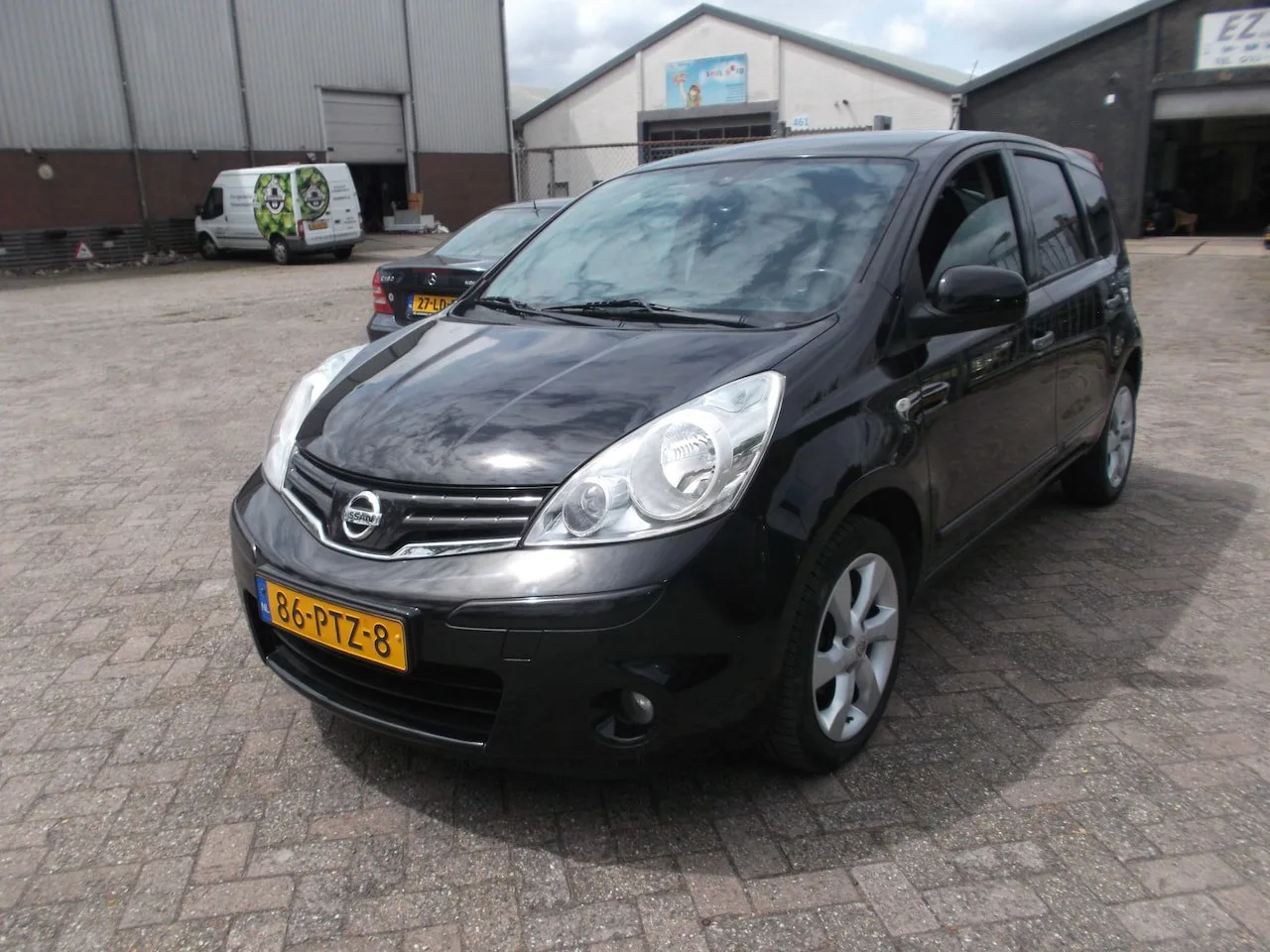 Nissan Note (2011) — foto 1