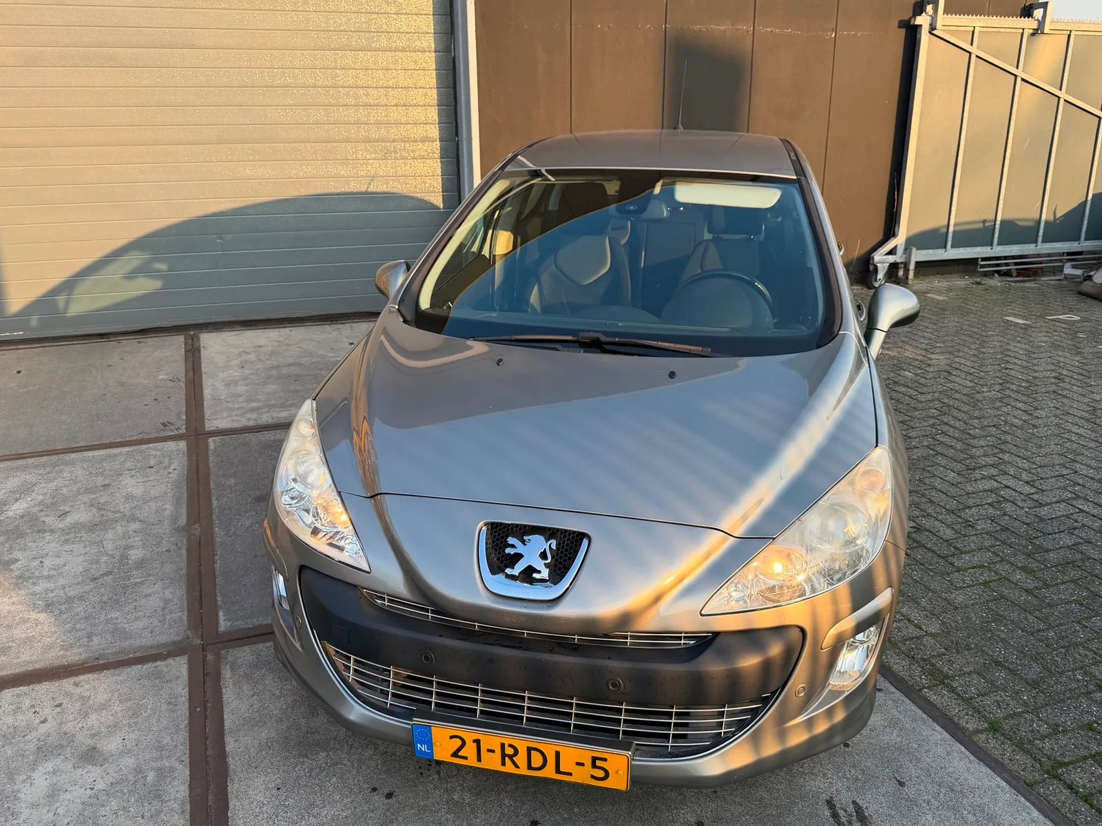 Peugeot 308 (2011) — foto 1