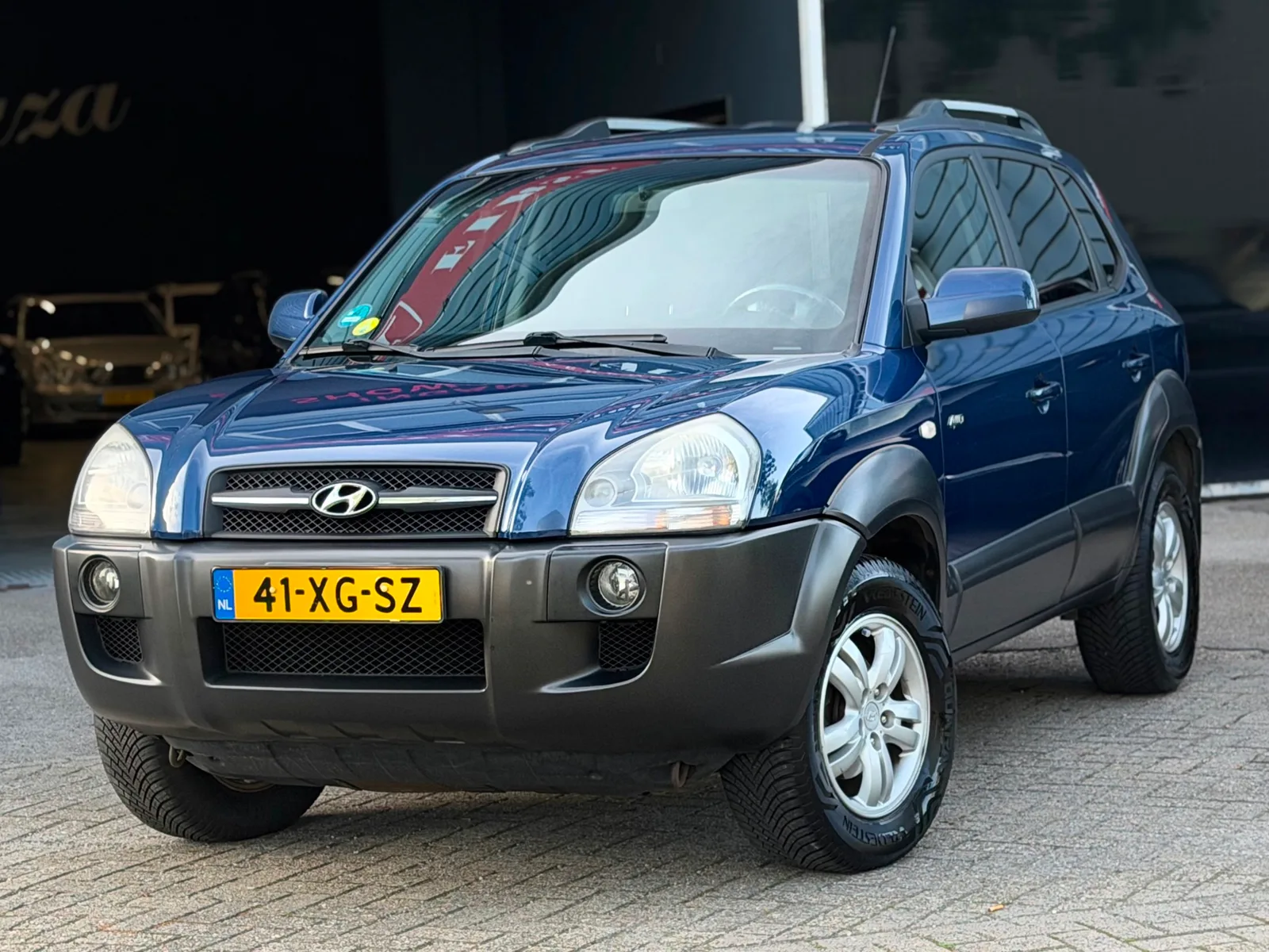 Hyundai Tucson (2007) — foto 1