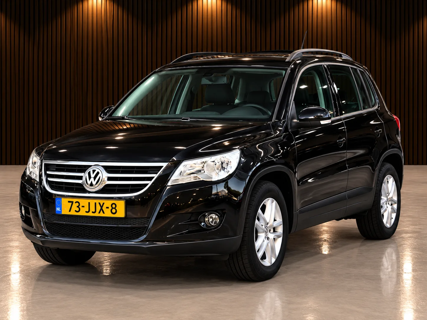 Volkswagen Tiguan (2009) — foto 1