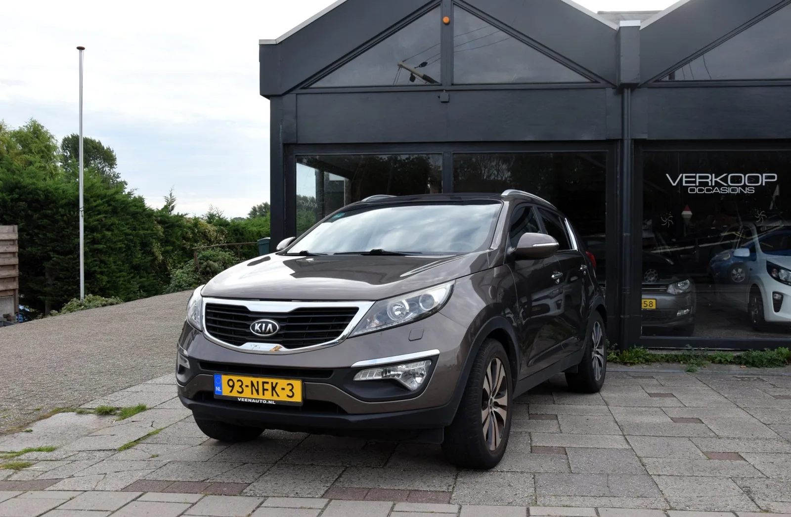 Kia Sportage (2010) — foto 1