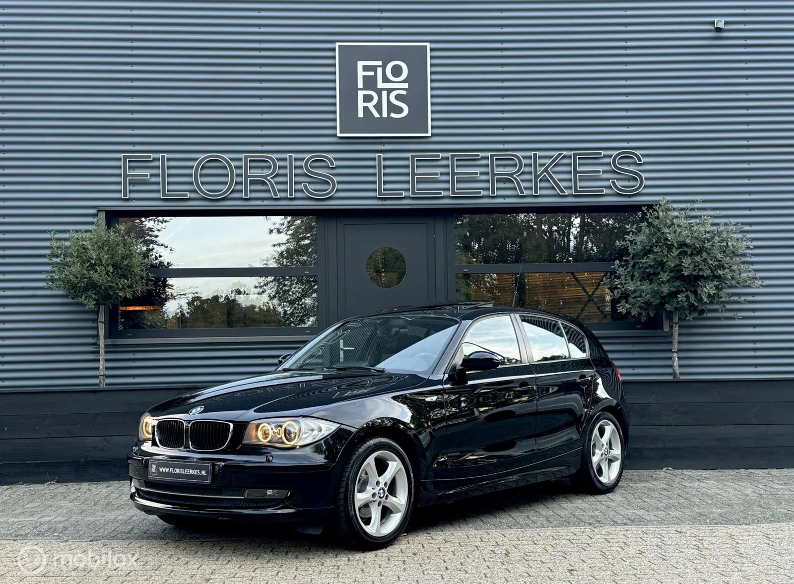 BMW 1-Serie (2009) — foto 1