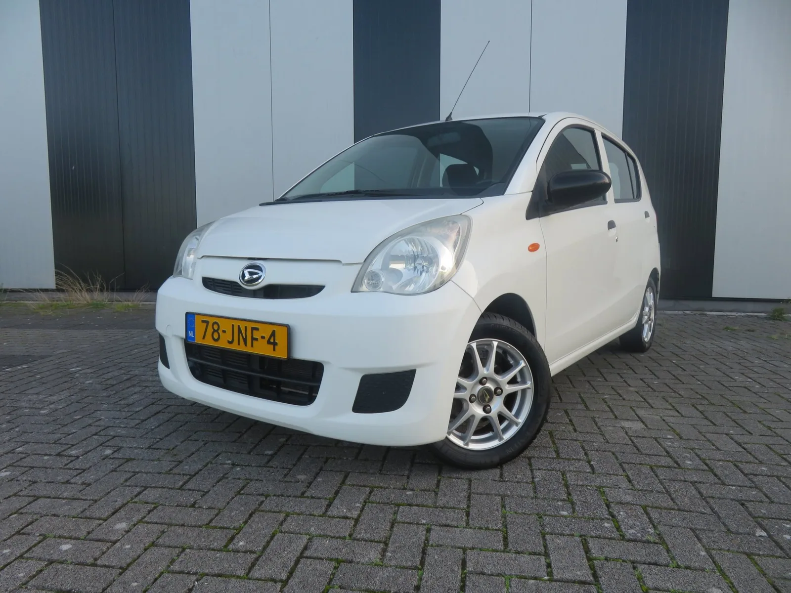 Daihatsu Cuore (2009) — foto 1