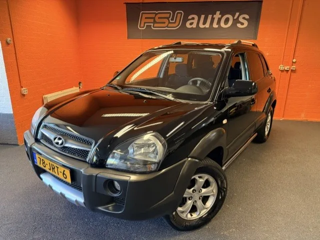 Hyundai Tucson (2009) — foto 1