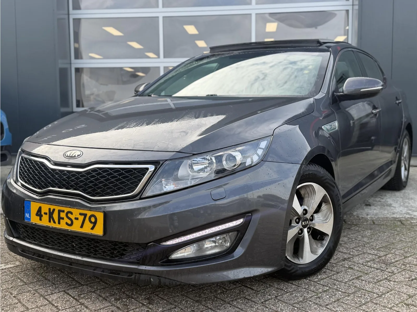 Kia Optima (2013) — foto 1