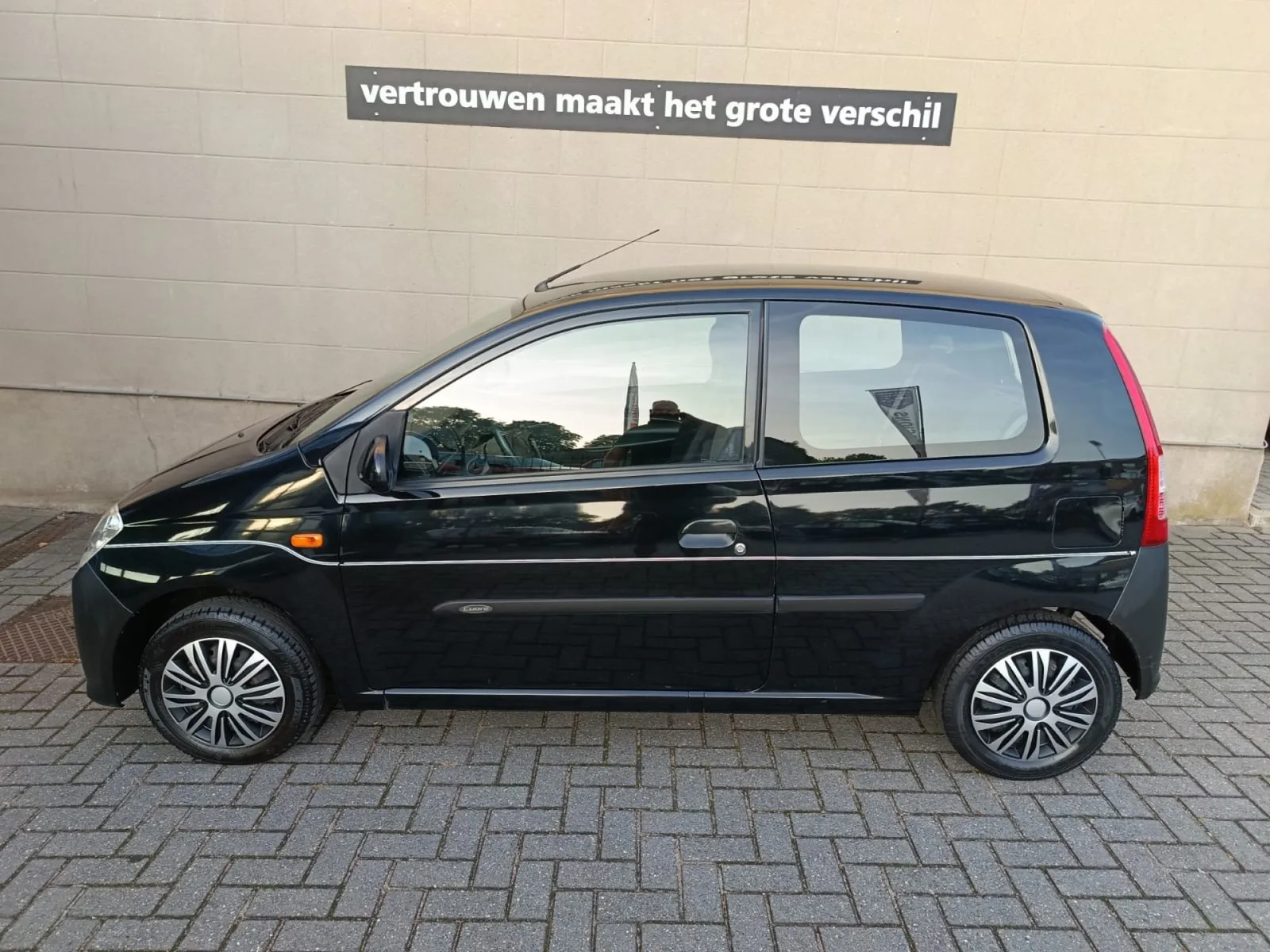 Daihatsu Cuore (2006) — foto 1