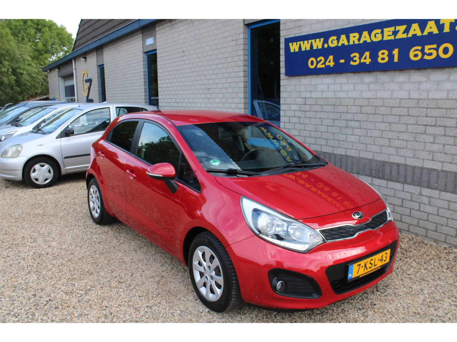 Kia Rio (2013) — foto 1
