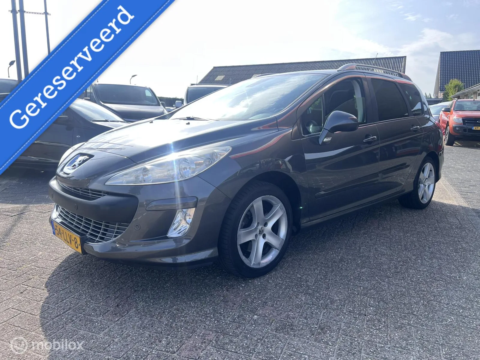Peugeot 308 (2010) — foto 1