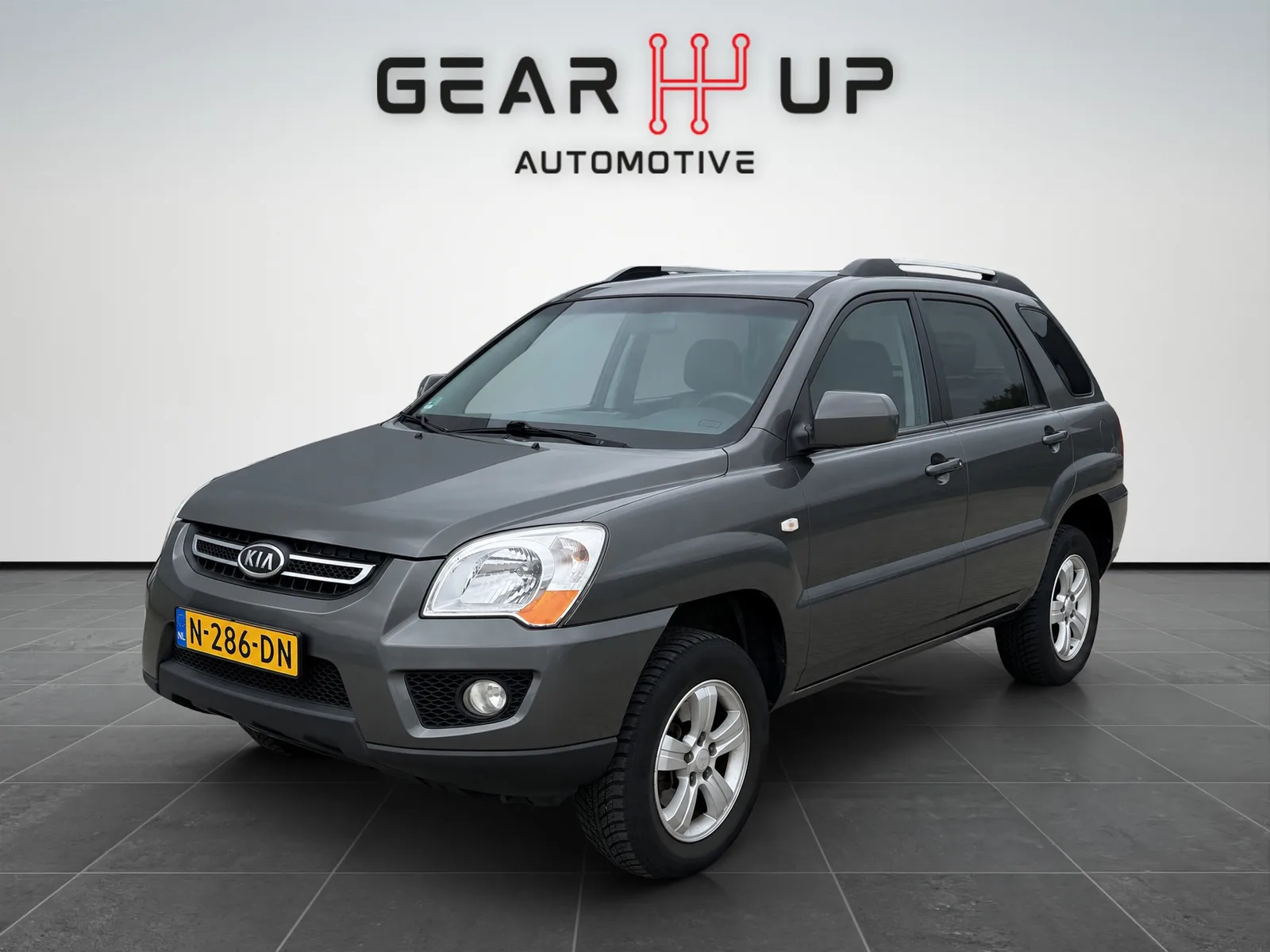 Kia Sportage (2010) — foto 1