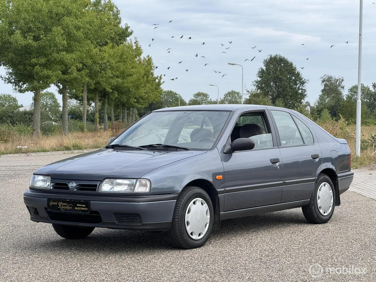 Nissan Primera (1994) — foto 1