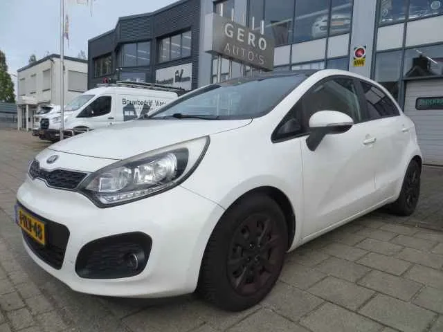 Kia Rio (2014) — foto 1