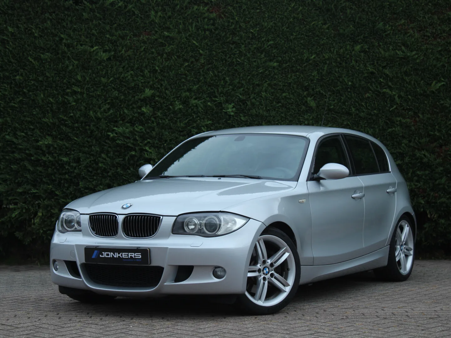 BMW 1-Serie (2006) — foto 1