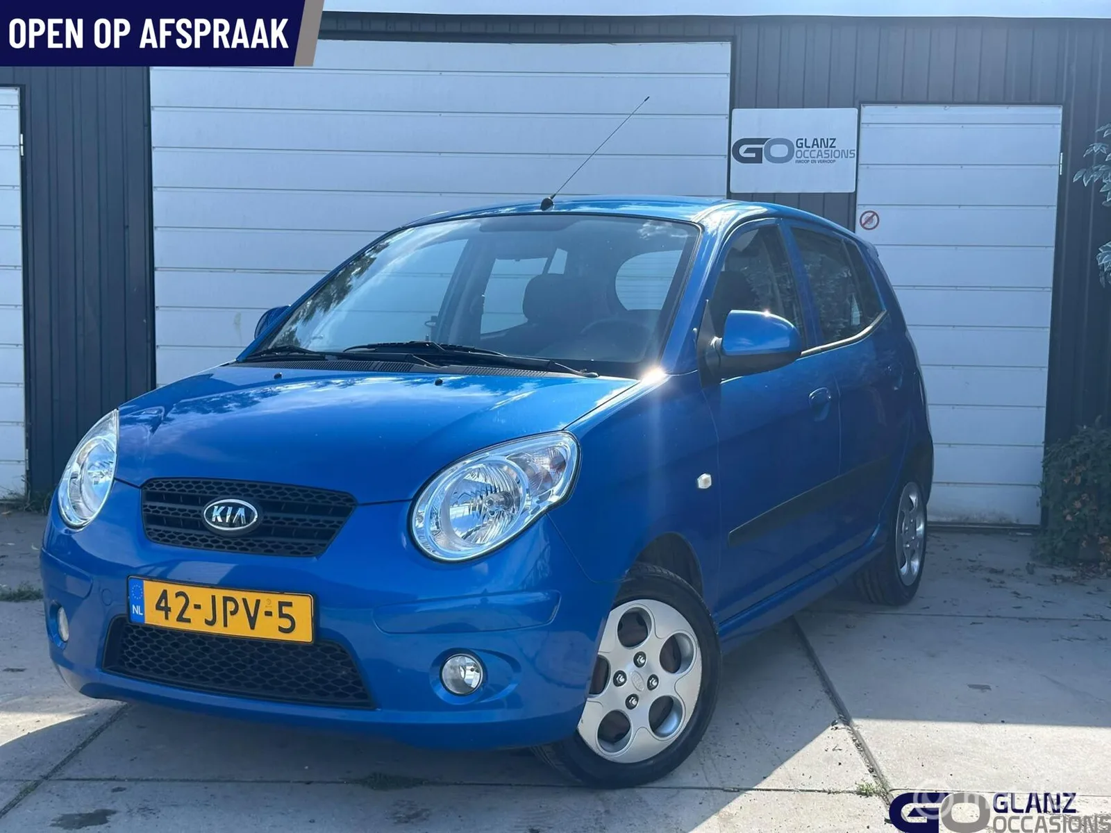 Kia Picanto (2009) — foto 1