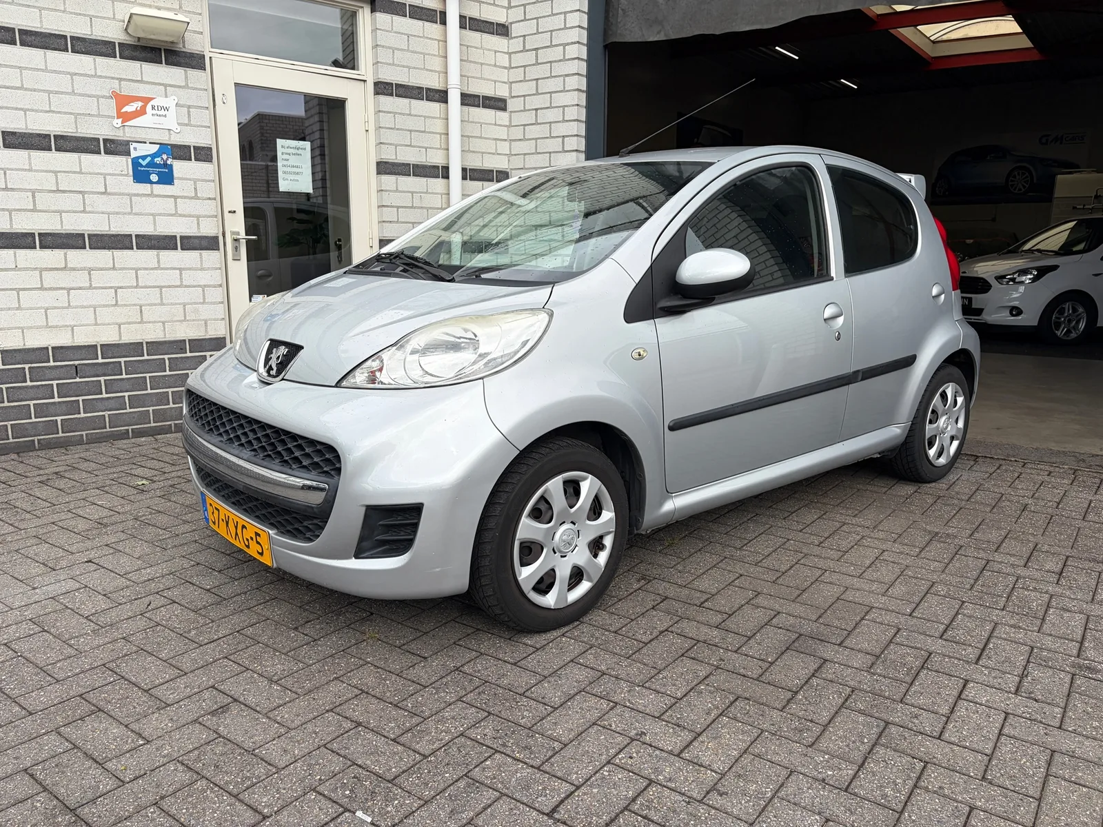 Peugeot 107 (2010) — foto 1