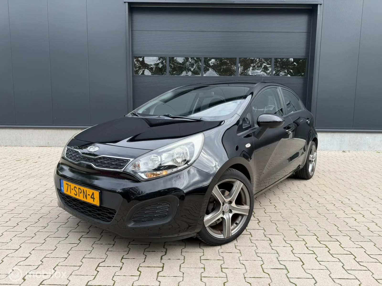 Kia Rio (2012) — foto 1