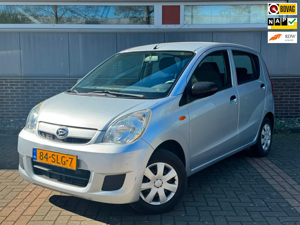 Daihatsu Cuore (2011) — foto 1