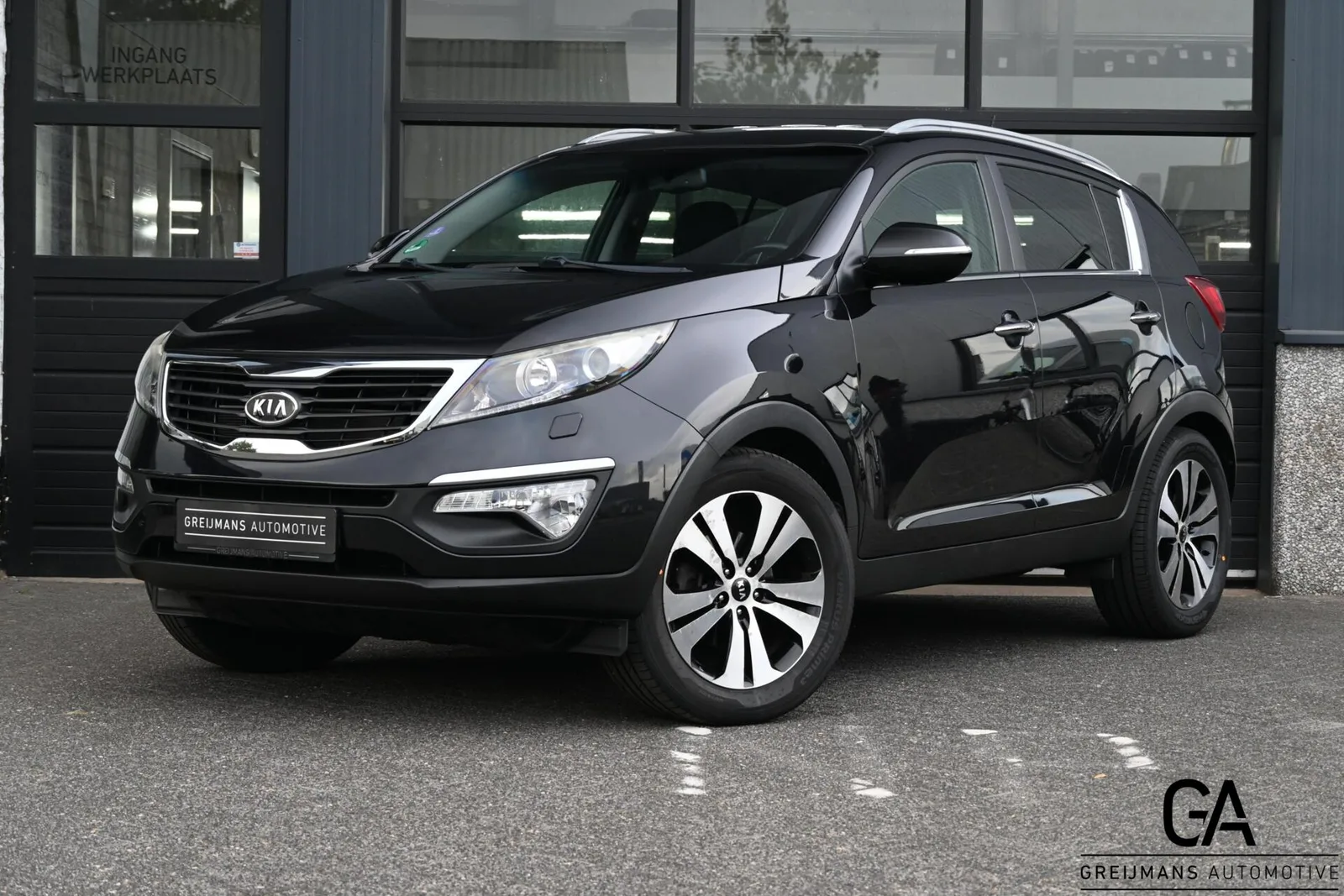 Kia Sportage (2012) — foto 1