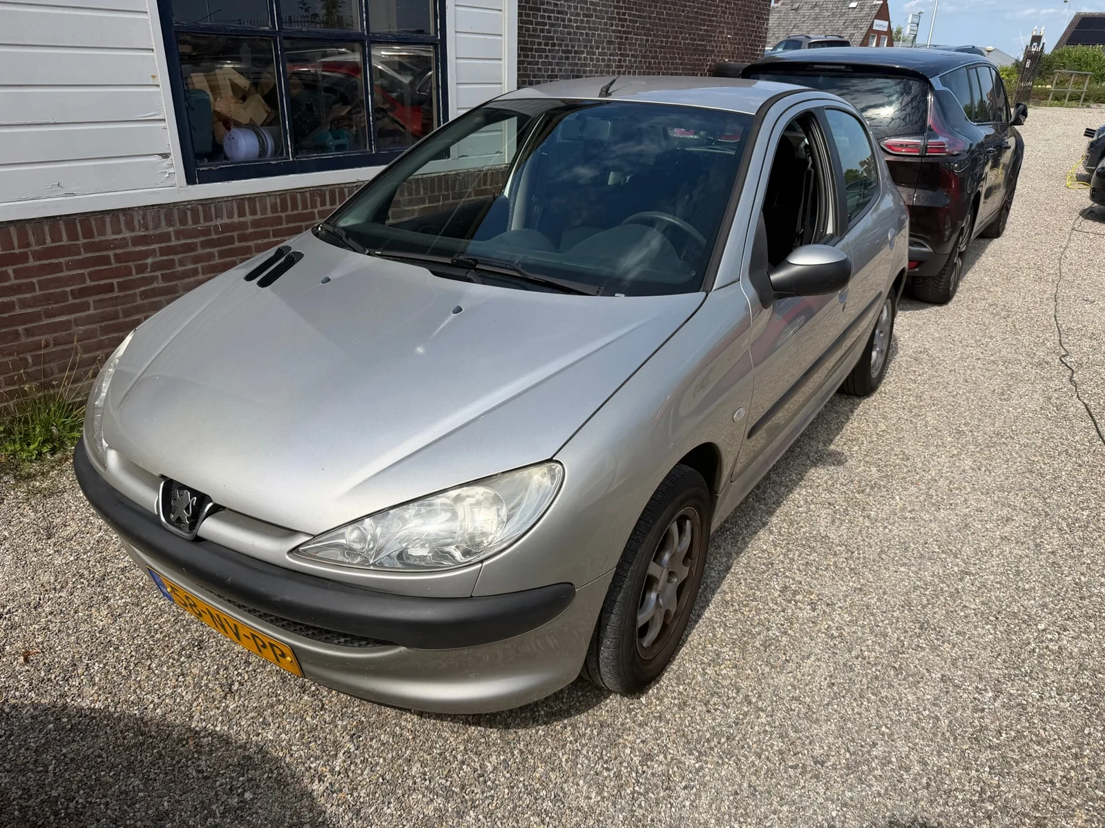 Peugeot 206 (2004) — foto 1