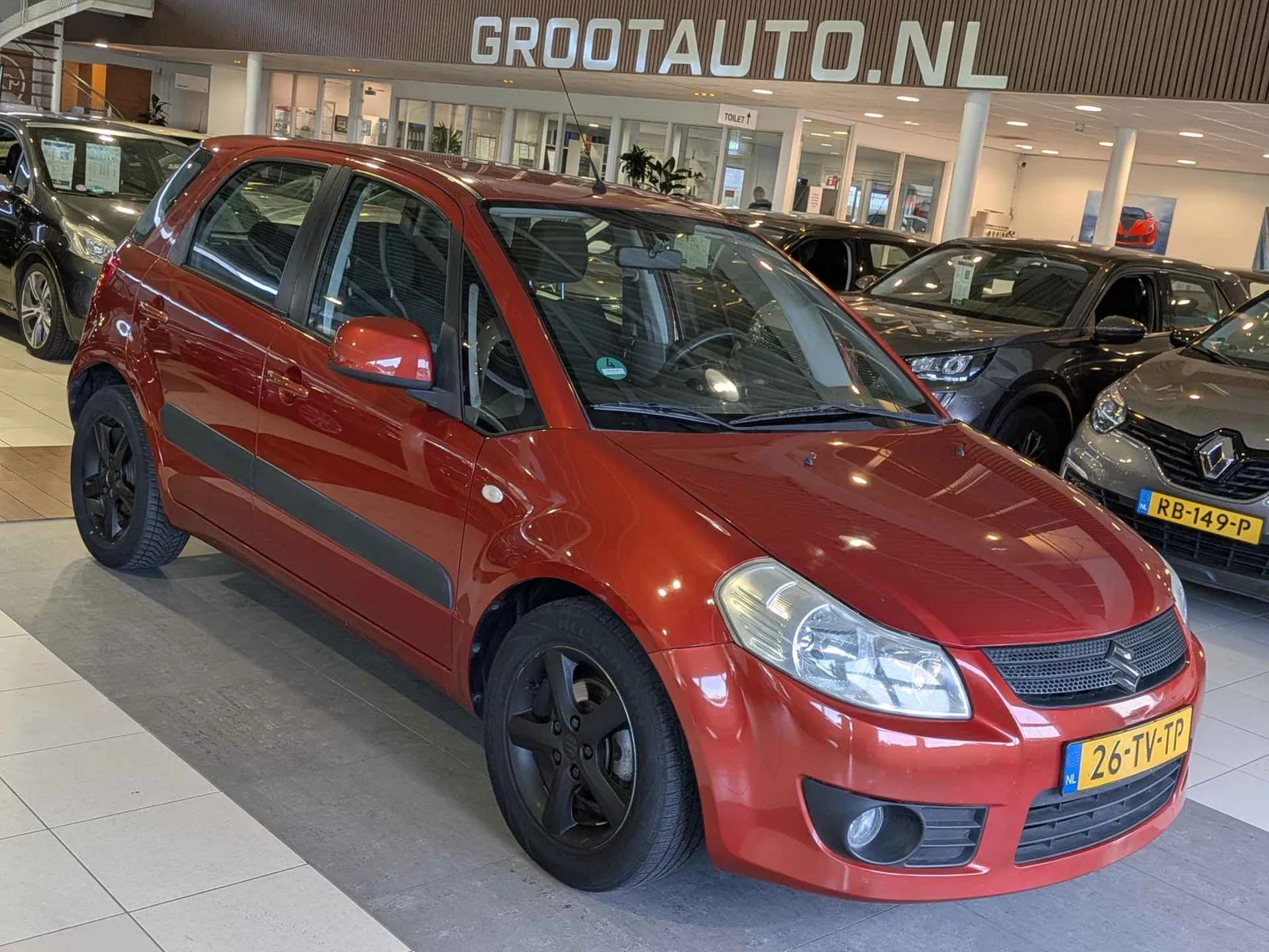 Suzuki SX4 (2007) — foto 1
