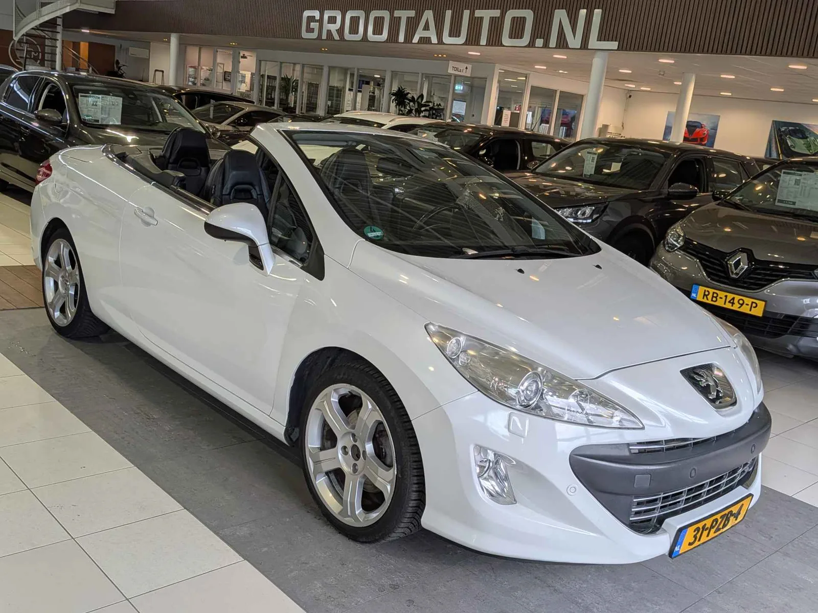 Peugeot 308 (2009) — foto 1