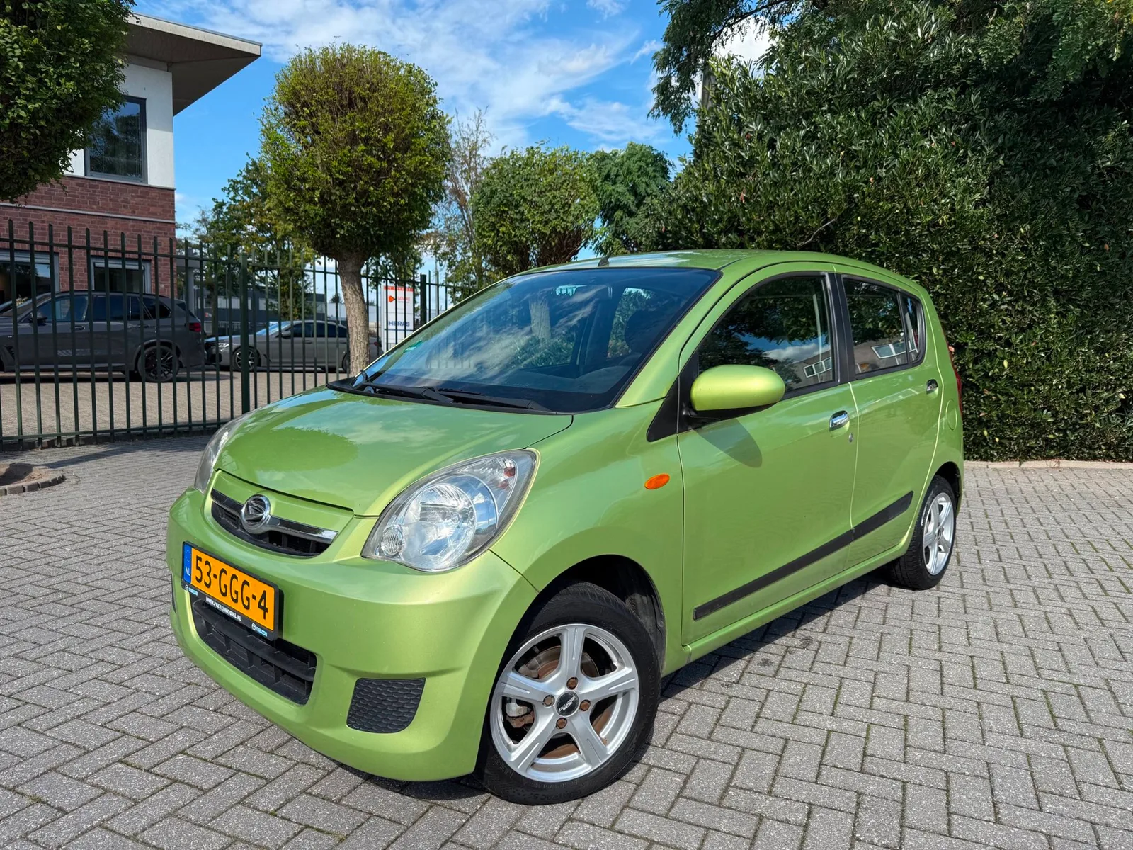 Daihatsu Cuore (2008) — foto 1