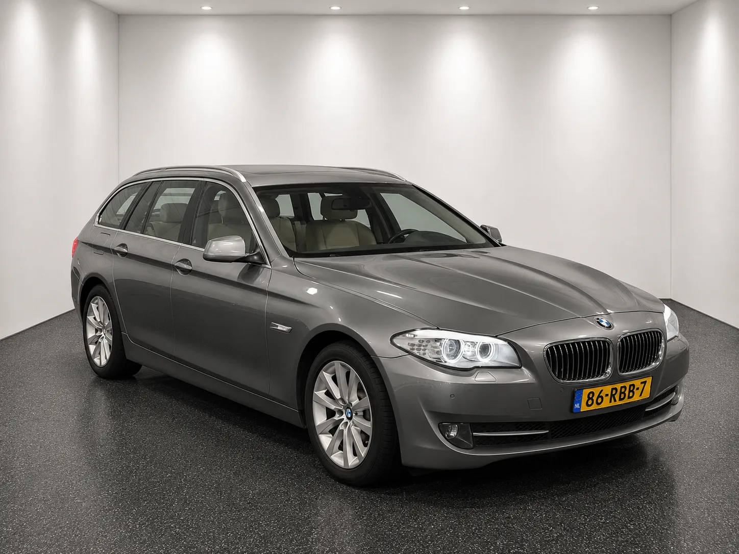 BMW 5-Serie (2011) — foto 1
