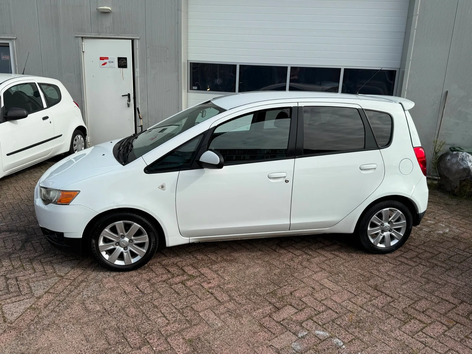 Mitsubishi Colt (2010) — foto 1
