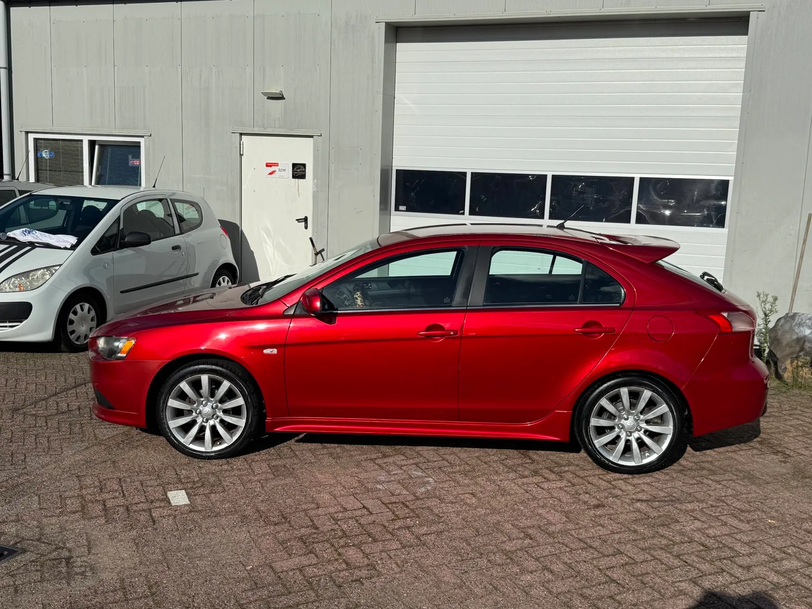 Mitsubishi Lancer (2009) — foto 1