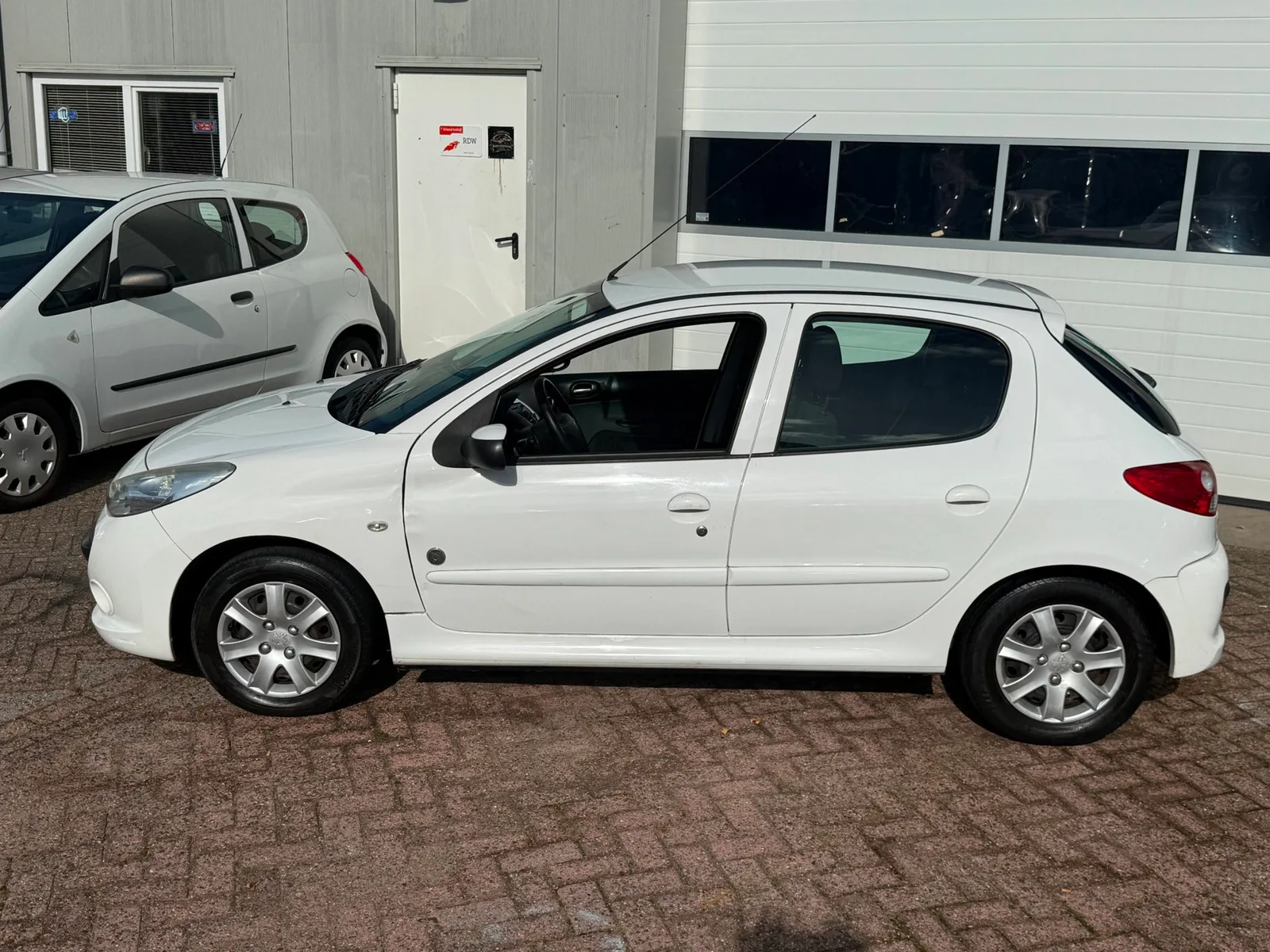 Peugeot 206+ (2012) — foto 1