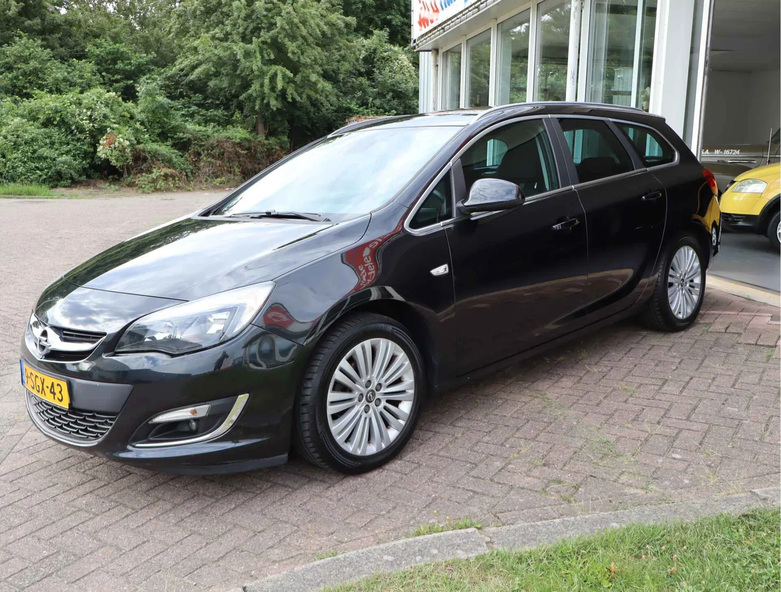 Opel Astra (2013) — foto 1