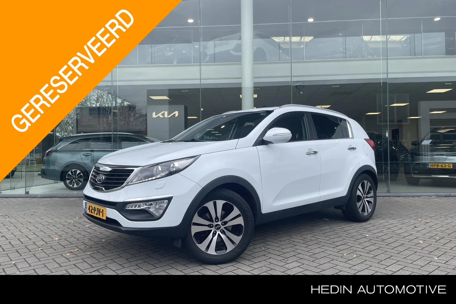Kia Sportage (2011) — foto 1
