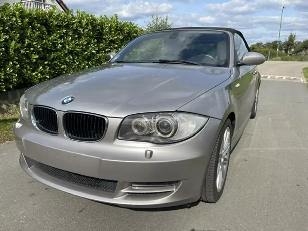 BMW 1-Serie (2009) — foto 1