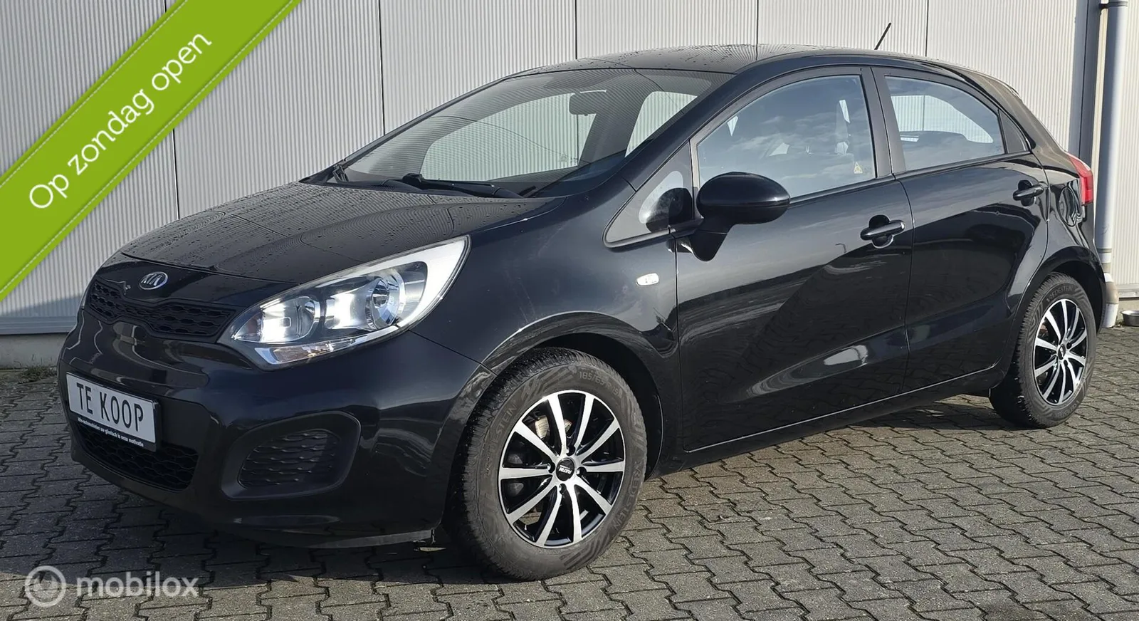 Kia Rio (2013) — foto 1