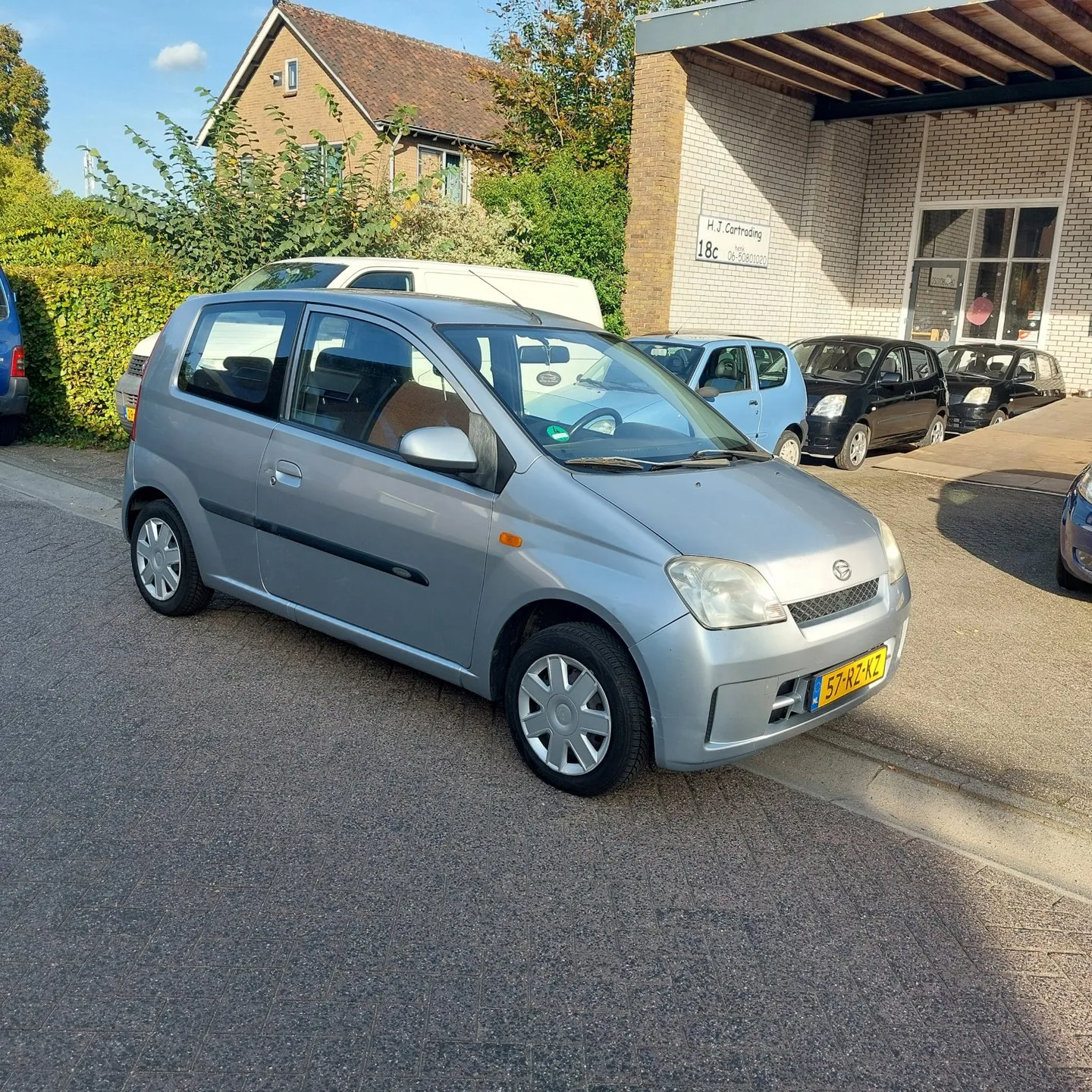 Daihatsu Cuore (2005) — foto 1