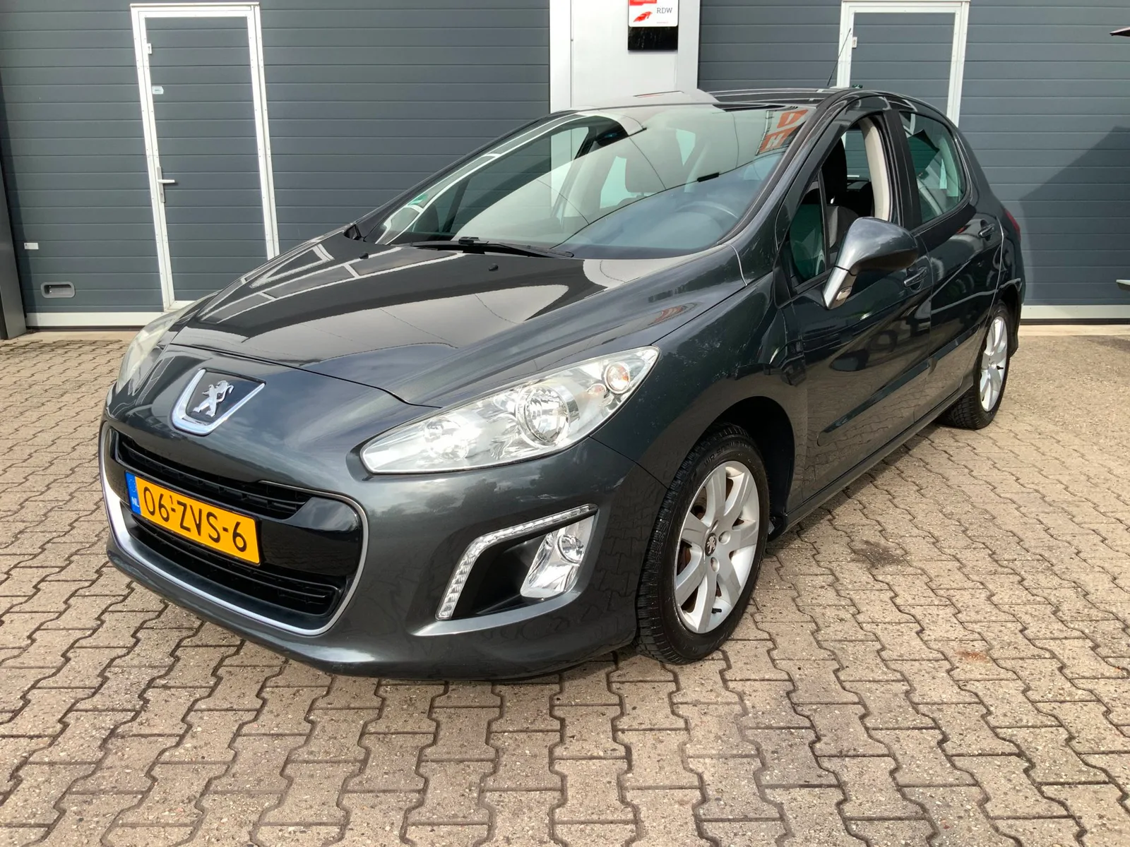 Peugeot 308 (2012) — foto 1