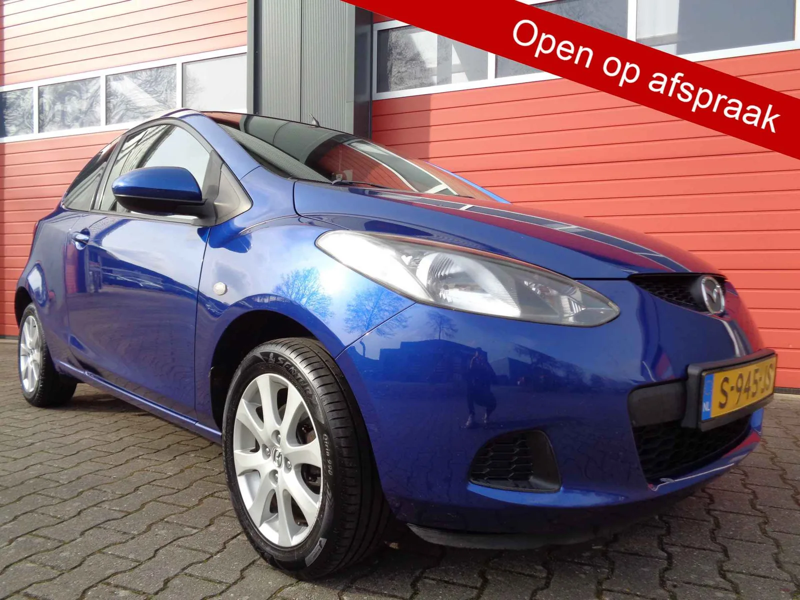 Mazda 2 (2009) — foto 1