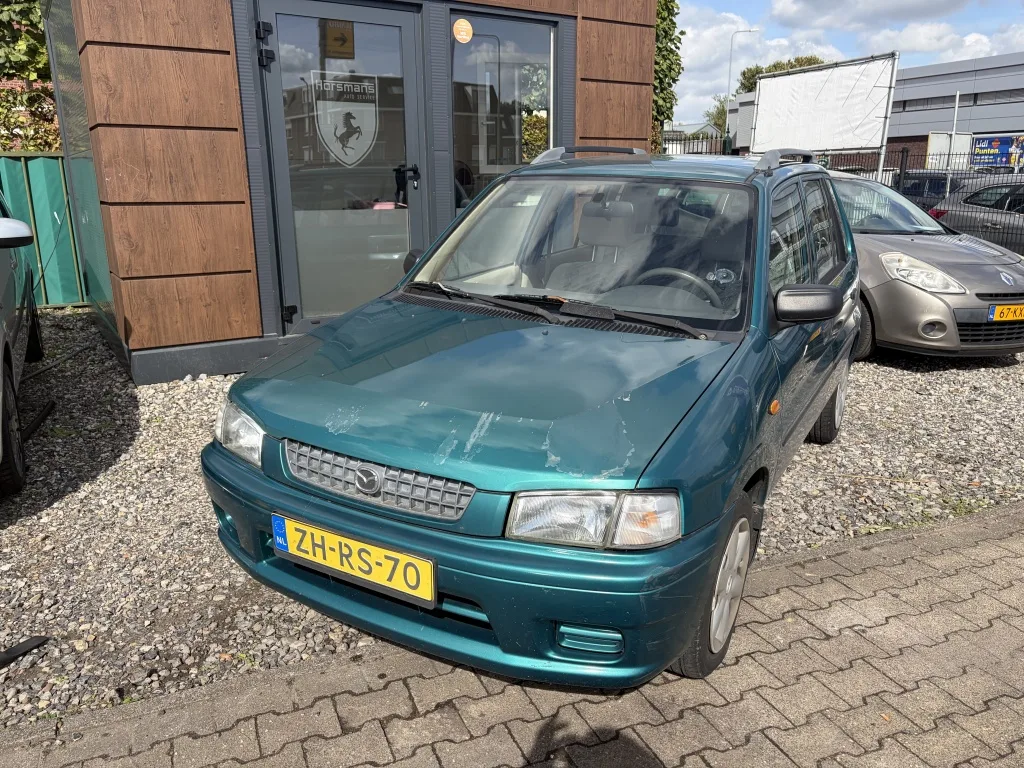 Mazda Demio (1999) — foto 1