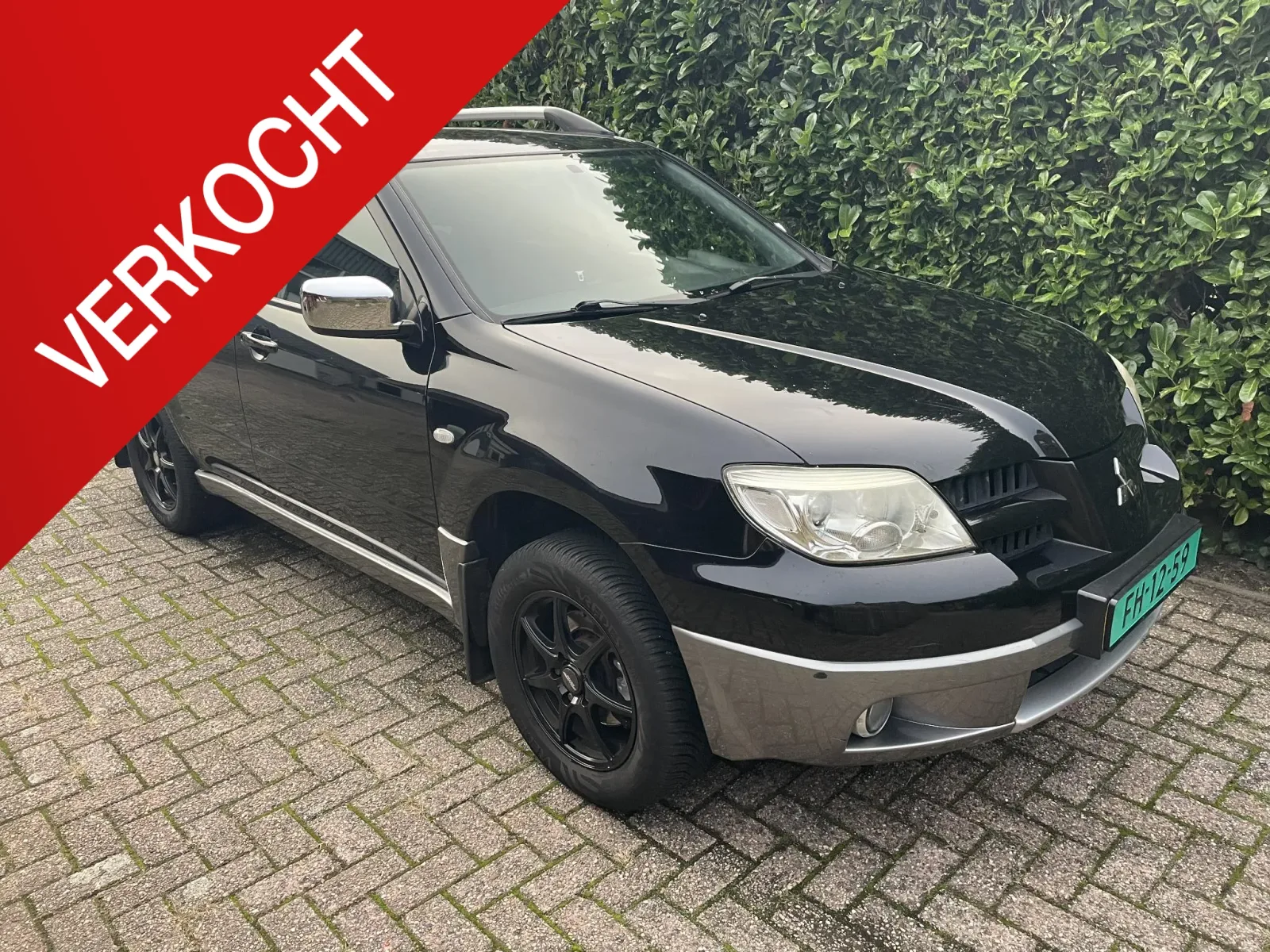 Mitsubishi Outlander (2008) — foto 1