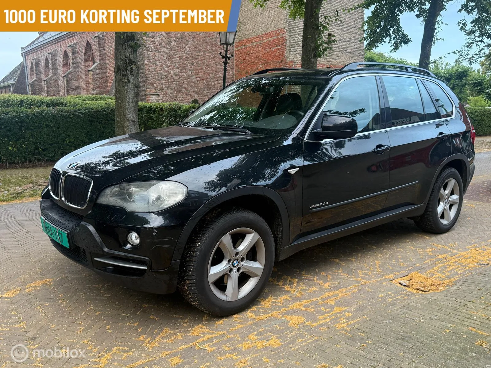 BMW X5 (2010) — foto 1