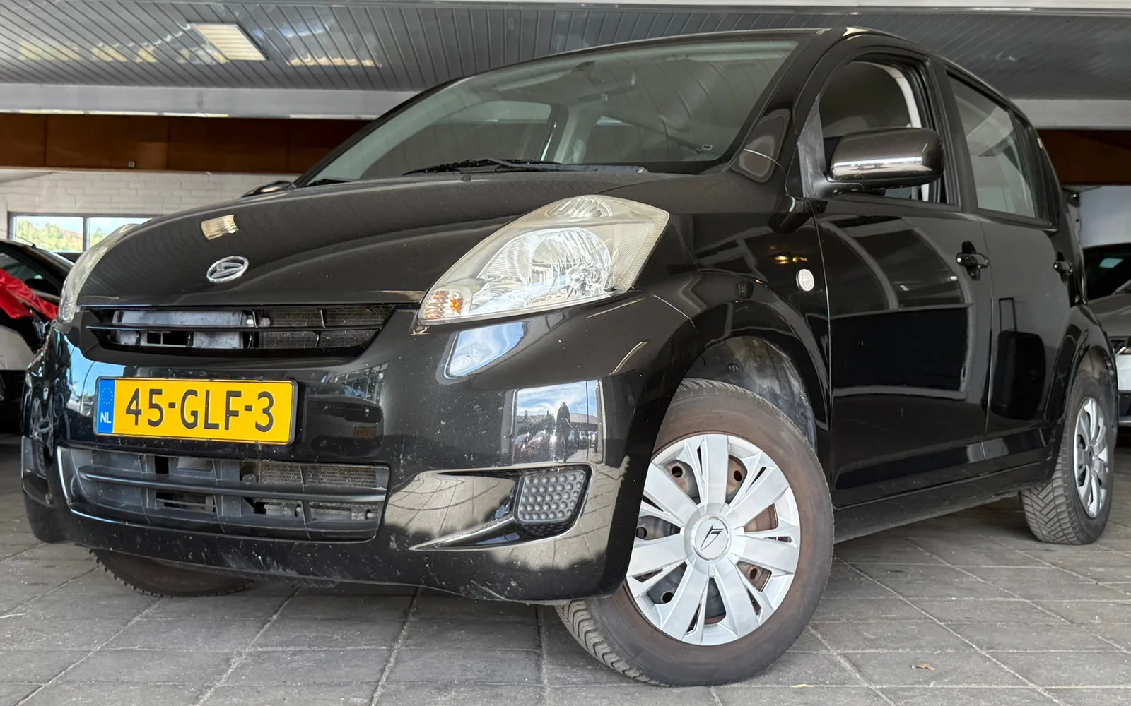 Daihatsu Sirion (2008) — foto 1