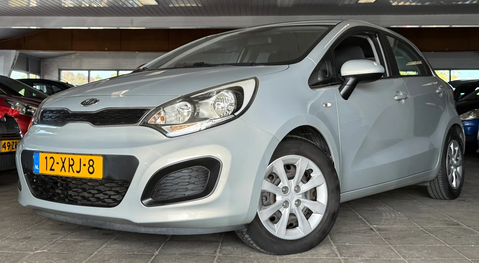 Kia Rio (2012) — foto 1