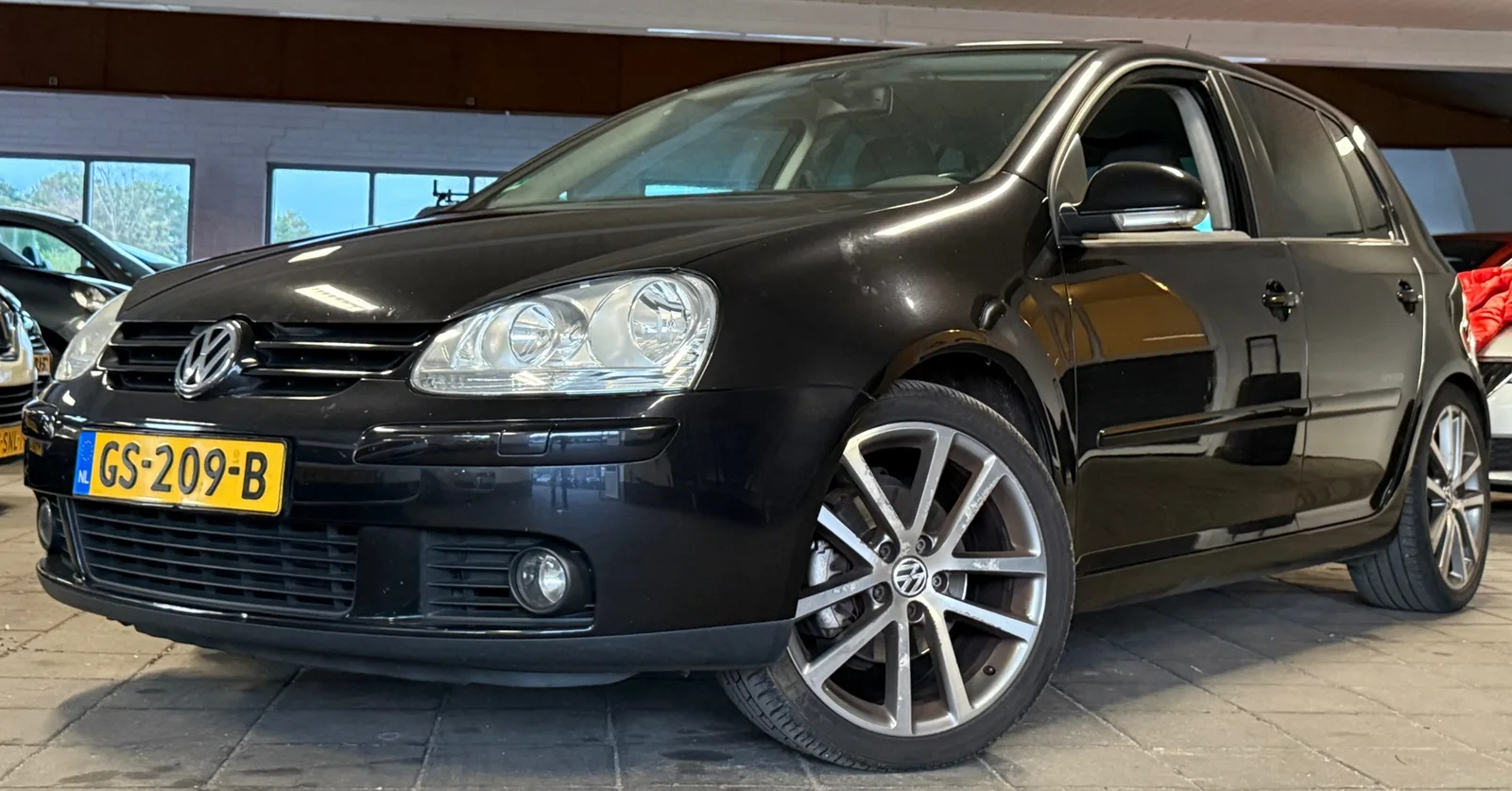 Volkswagen Golf (2008) — foto 1