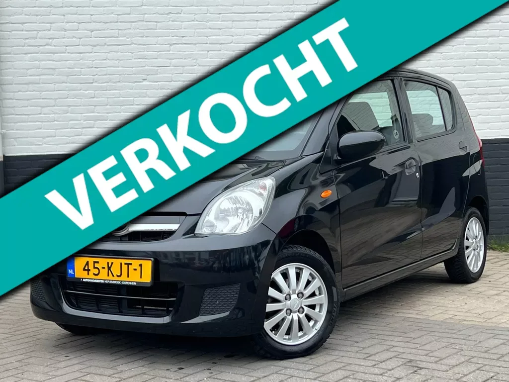 Daihatsu Cuore (2009) — foto 1