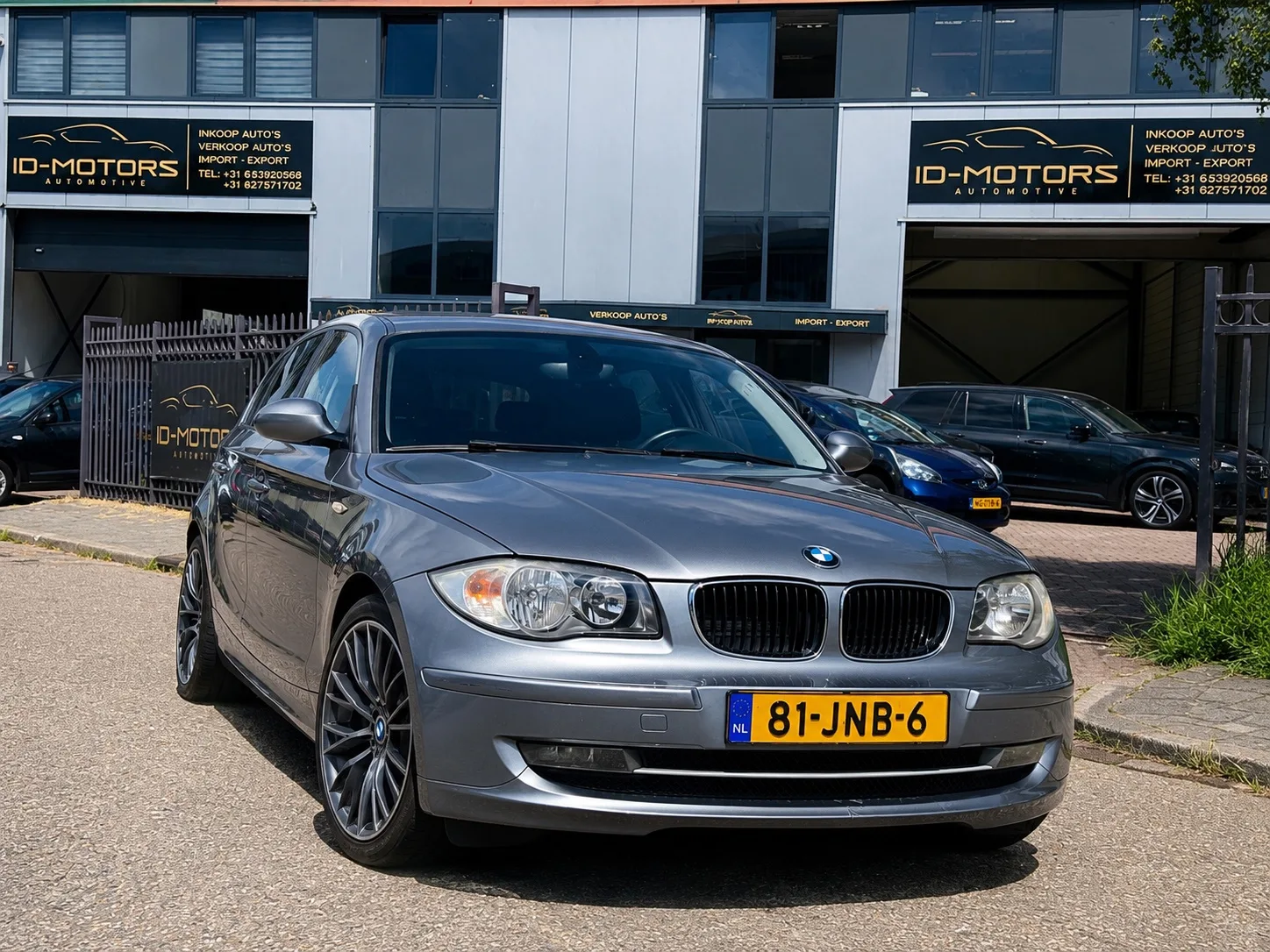 BMW 1-Serie (2009) — foto 1
